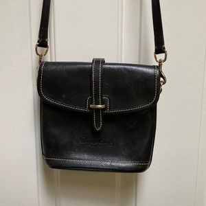 Dooney & Bouke crossbody black leather purse. Gently used condition.